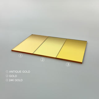 A display of 3 shades of gold mirror acrylic which are the colours available for this product. The left shade is antique gold, the middle is just bright gold or pale gold or simply &quot;gold&quot;, and the right shade is 24K gold.